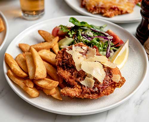 Kelly’s Weekday Specials-website-500px-x-410px-schnitzel-parma