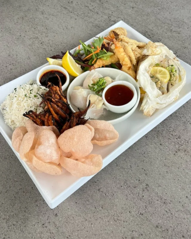 Seafood lovers, this one’s for you 🐟🦐

This Weekend Special at Kelly’s is a Mixed Seafood Platter stacked with an aromatic steam-baked barramundi parcel, grilled marinated squid, torpedo prawns, netted crab rolls, scallop dumplings, crispy fried squid, steamed rice, prawn crackers, fresh salad, and a line-up of dipping sauces to match.

It’s big, it’s bold, and it’s only around for the weekend — don’t miss it!